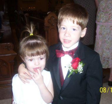 my lil princess with the ring bearer connor