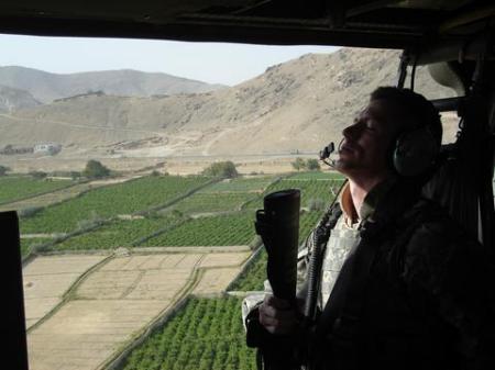 Rick catching some zzz's on the Blackhawk in Afghanistan