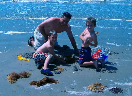 Scott with the boys on the beach