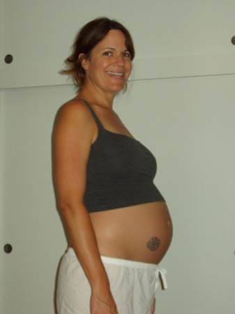 Me, 7 months pregnant with our first...