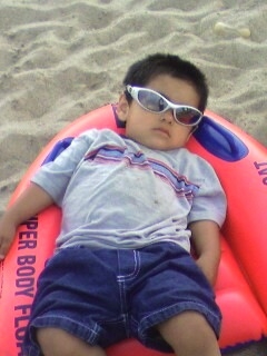 TAKING A NAP AT THE BEACH