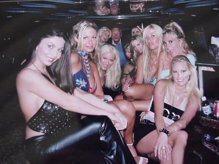 Brunette in the front with Hef and the girls