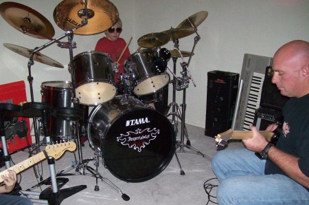 ray-ray on drums & daddy on guitar