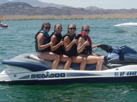 Bryanna and friends riding on MY boat