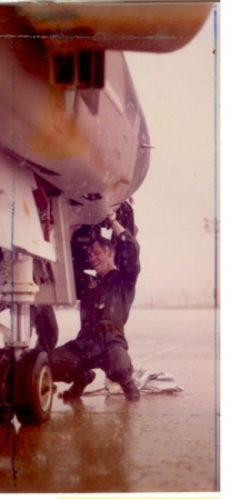 Buttoning up an RF-4 in a downpour 1975