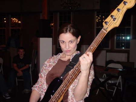 Noelle playing bass at East Coast gig 2004