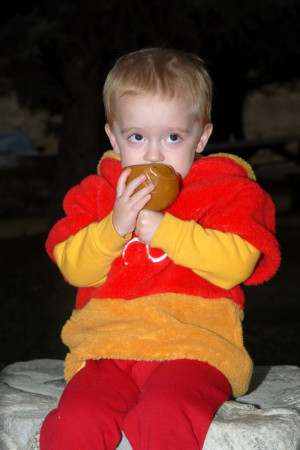 William enjoying a carmel apple treat.