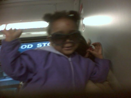 My goddaughter with her crazy self. Her name's La'shawn and she's 2.