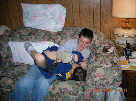 The kids wrestling on Granny's  couch