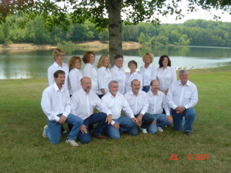 Hubby(bottom far right), his Mom and siblings.