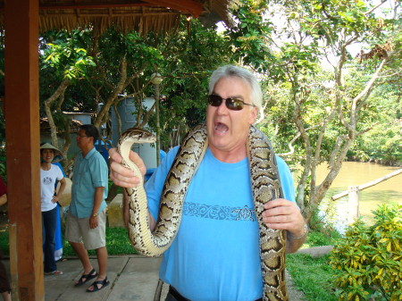 Playing with snakes in the Mekong Delta