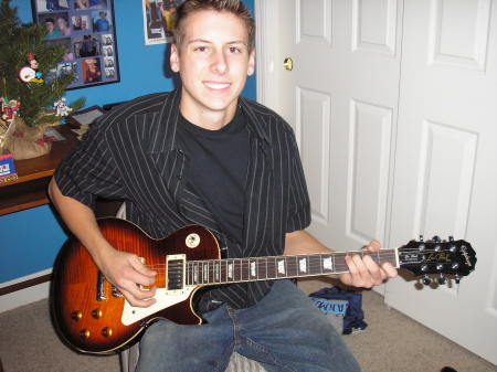 paul playing guitar