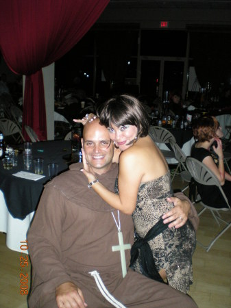 Our host Marcela getting sweet on my husband!