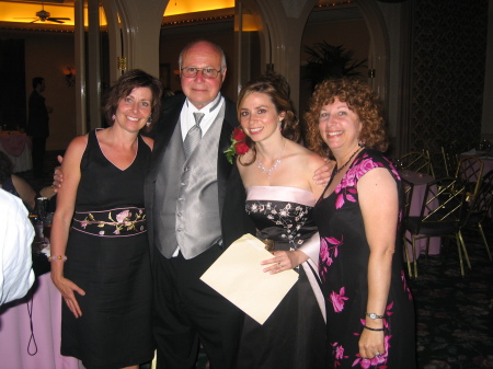 My cousin Julie, my dad, me, and our friend Laura at my sister Marcy's wedding