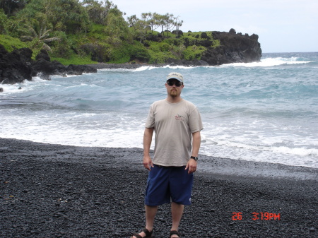 Me on the black sand beach on Maui