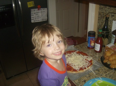 Kiernan making her own pizza