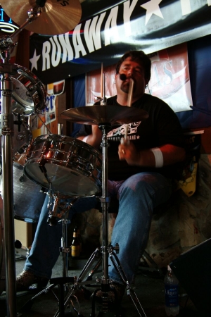 Me playing drums at Love & War in Texas