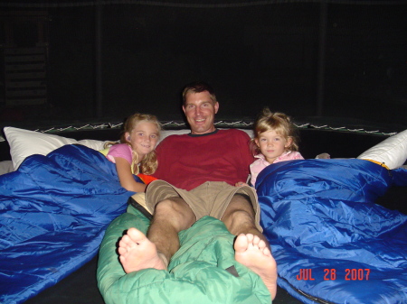 Rachel, Colby (my husband) and Riley sleeping out on the trampoline