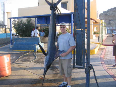 My hubby & his big fish in Cabo
