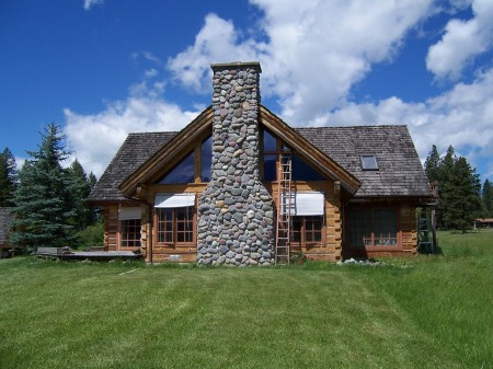 east side with rock fireplace