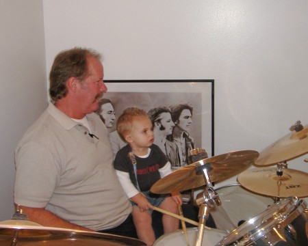 teaching Will to play drums
