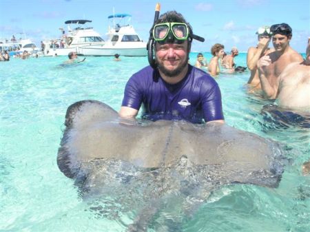 me holding a stingray in Grand Cayman