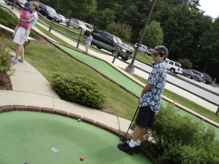 Skylar playing mini-golf