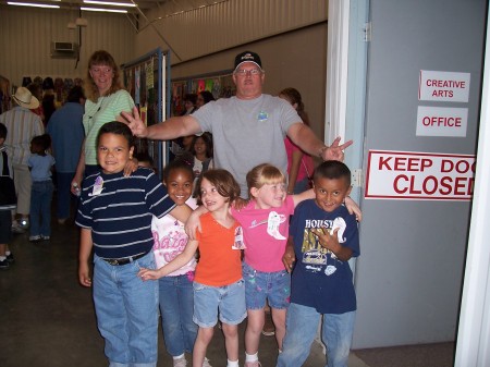 Me helping the First Grade Class At the Wharton Co. Fair