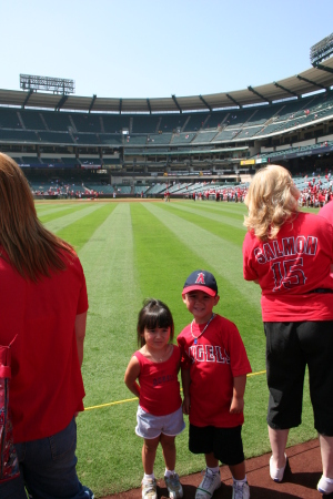 RJ and Kalia Posing On The Field Of Angels Stadium 08/2006