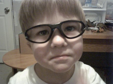 My little goofball that loves glasses