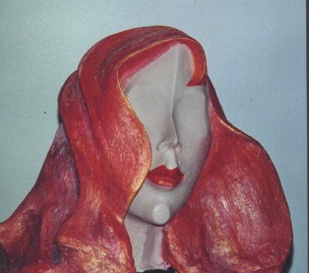 Huge red head built in clay and fired in kiln then painted
