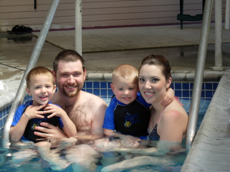 Oldest daughter Shelley (holding her son, Gannon), her husband Scott (holding my other grandson, Brennan )