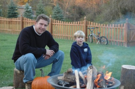Dylan w/Dad back yard fire