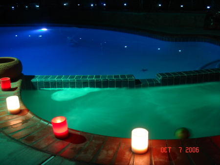 My pool and Jacuzzi at home at night!