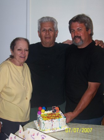 Mom, dad and me celebrating my 50th Birthday.