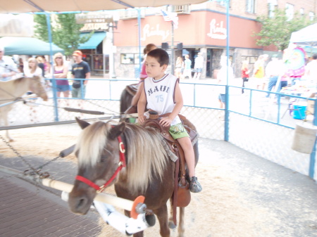 My son Kian, at fair with grammy and granpa