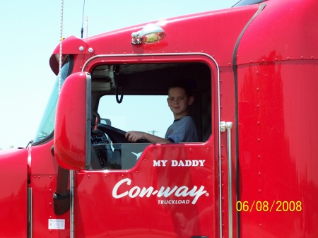 My grandson in my truck