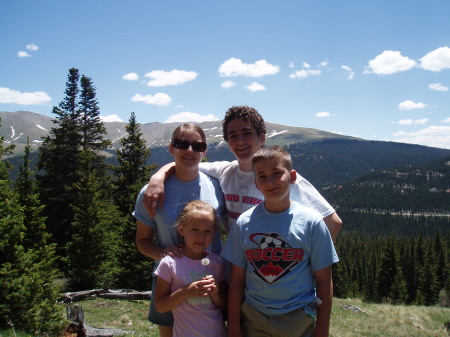 the kids at the top of Quandry Peak near Breckenridge