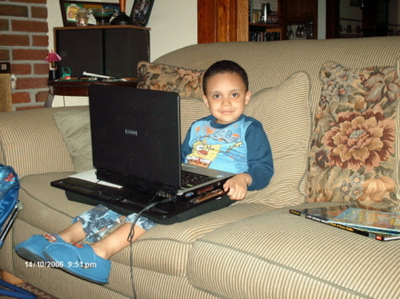 My son Devin the genius on my laptop