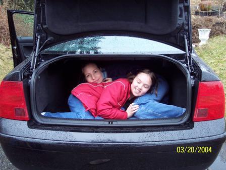 Sarah and Anna in our car trunk