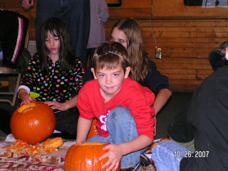 Carving pumpkins at the campground