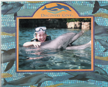 My son, Patrick, swimming w/dolphin