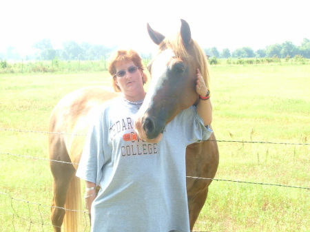 Me next to one of the horses in Oklahoma