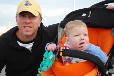 Kevin and Owen work the Town Center 5k