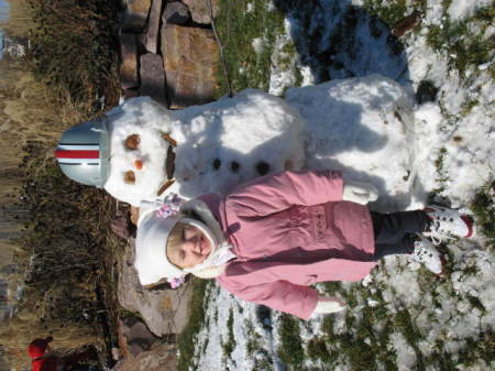 Addie and 1rst snowman