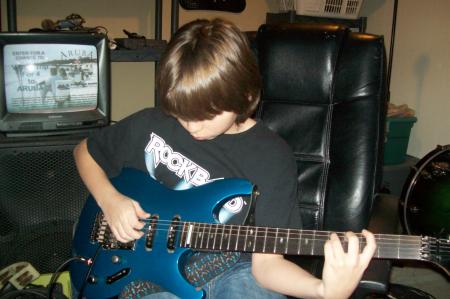 My son Bryce playing guitar!