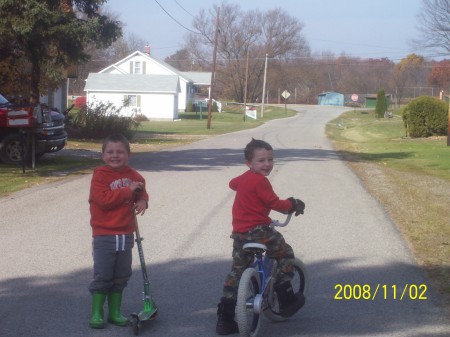Logan and his friend Carter riding bikes.