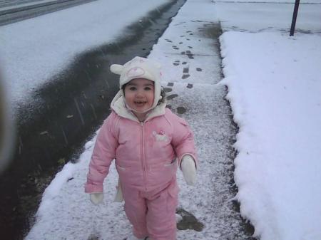 haylee playing in the snow