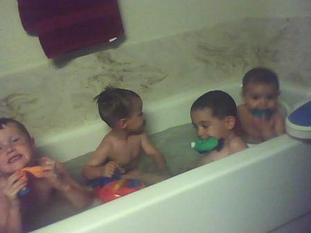 All 4 grandkids in tub