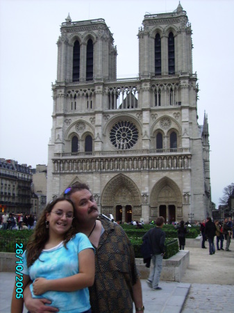 Daughter and hubby in front of Notre Dame Church in Paris